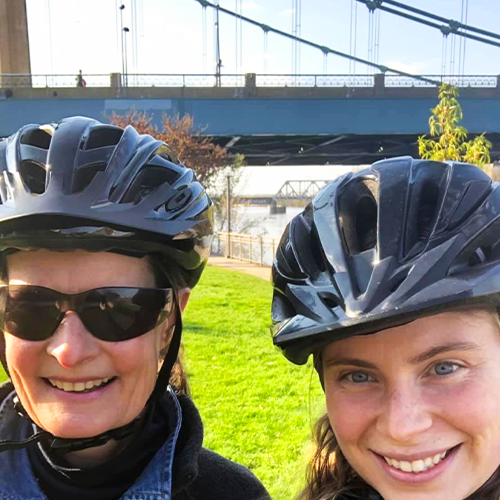 two women with bike helments on