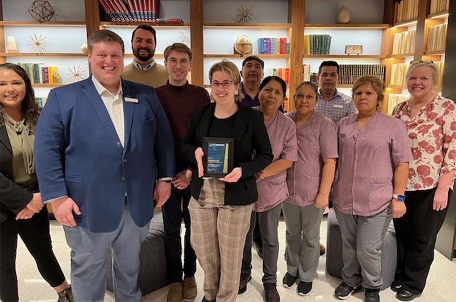 group of people and staff from indigo hotel